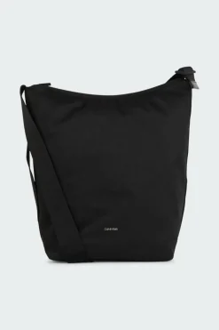 CK EASE HOBO - Sac bandoulière | Noir*CALVIN KLEIN Online