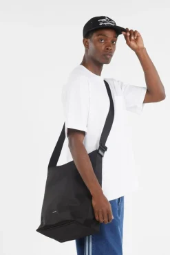 CK EASE HOBO - Sac bandoulière | Noir*CALVIN KLEIN Online
